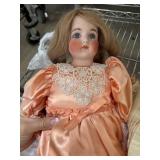 Three Porcelain Dolls in Period Costumes