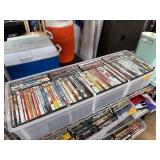 DVDs in Plastic Storage Bin