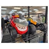 Two Toy Vehicles with Shark and Racer Designs