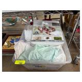 Plastic Tub with Bedding and Mattress Protector