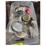 Metal Belt Buckles in Storage Bin