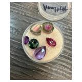 Polished and Raw Gemstones in Display Case