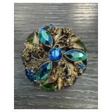 Gold-Tone Floral Brooch with Blue and Green Rhines