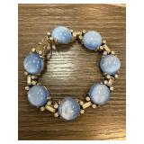 Gold-Toned Bracelet with Blue Cabochon Stones