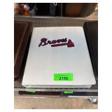 Binder of Baseball Cards Featuring Braves Logo