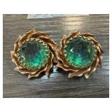 Gold-Toned Brooch with Green Gemstone Accents