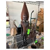 Carved Wooden Figurine with Intricate Detail