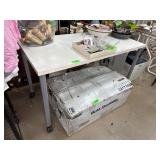 White Table with Metal Legs on Casters