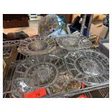 Four Clear Glass Snack Plates with Sunburst Design Four Clear Glass Snack Plates with Sunburst Design