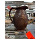 Brown Ceramic Pitcher With Pinecone Design Brown Ceramic Pitcher With Pinecone Design