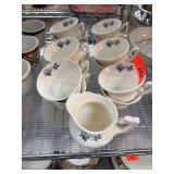 Floral Ceramic Teacups and Creamer Floral Ceramic Teacups and Creamer