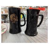 Two Black Amethyst Glass Mugs with Unique Designs Two Black Amethyst Glass Mugs with Unique Designs