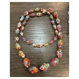 Handmade Glass Bead Necklace with Decorative Desig