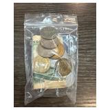 Coins and Banknotes in Plastic Bag