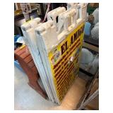 White A-Frame Sign with El Amigo Advertising Displ