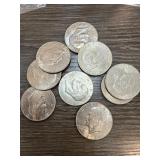 9 Ike Dollar Coins from Various Years