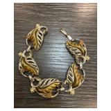 Gold-Toned Leaf Motif Bracelet with Rhinestones