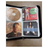 Binder of Mixed CDs and Album Covers