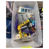 LEGO Pieces and Instructions in Plastic Bin