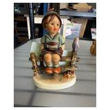 Goebel Hummel Figurine of Boy on Bench with Bird