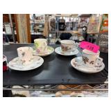 Four Decorative Mini Teacups with Saucers