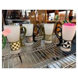 Four Frosted Glass Mugs with Geometric Handles