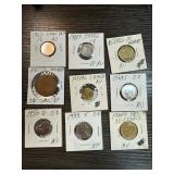 Eight World Coins with Varying Grades