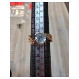 14KGP Blue Topaz Ring with Twisted Band Design