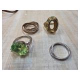 Four Mixed Metal Rings, One Marked Silver