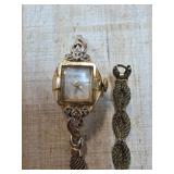 14k Gold Womenï¿½s Wristwatch with Ornate Band