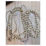 Four Shell and Tooth Necklaces