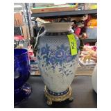 Porcelain Vase with Floral Motif and Gilded Base
