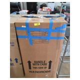 Cardboard Box Containing Clothes