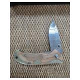 Buck 110 Pocket Knife with Wood and Metal Handle