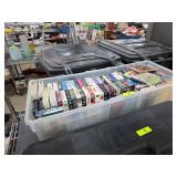 VHS Tapes in Plastic Storage Bin