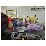 Pokemon Themed Collectible Lot with Plush, Tin, an