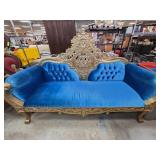 Gold-Framed Blue Velvet Sofa With Ornate Backrest