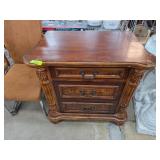 Wooden Three-Drawer Cabinet with Ornate Detailing