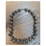 Beaded Necklace With Black and White Patterned Bea