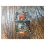 Silver Bracelet with Ornate Design and Orange Ston