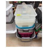 Stack of Assorted Plastic Storage Tubs