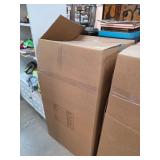 Large Box Filled With Various Clothes