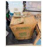 Clothes in U-Haul Box