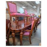 Wood Dining Table with Carved Legs and Eight Pink