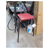 Black and Red Overarm Router Table with Missing Bo