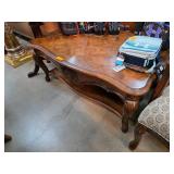 Ornately Carved Wooden Coffee Table with Burlwood