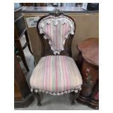 Ornately Carved Wood Chair with Striped Upholstery