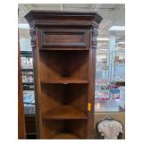 Dark Wood Corner Shelf With Ornate Top and Carved