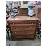 Wooden Four-Drawer Dresser with Decorative Grain a