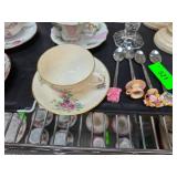 Tea Cups and Decorative Spoons with Floral Motifs
